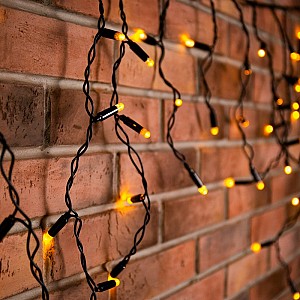 Гирлянда светодиодная Бахрома (Айсикл) 4,8х0,6м 176 LED ТЕПЛЫЙ БЕЛЫЙ черный ПВХ IP65 эффект мерцания 230В нужен блок питания 303-500 NEON-NIGHT